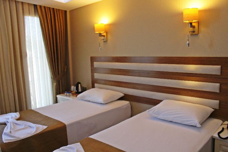 Quarto standard vista mar lateral, Feza Otel