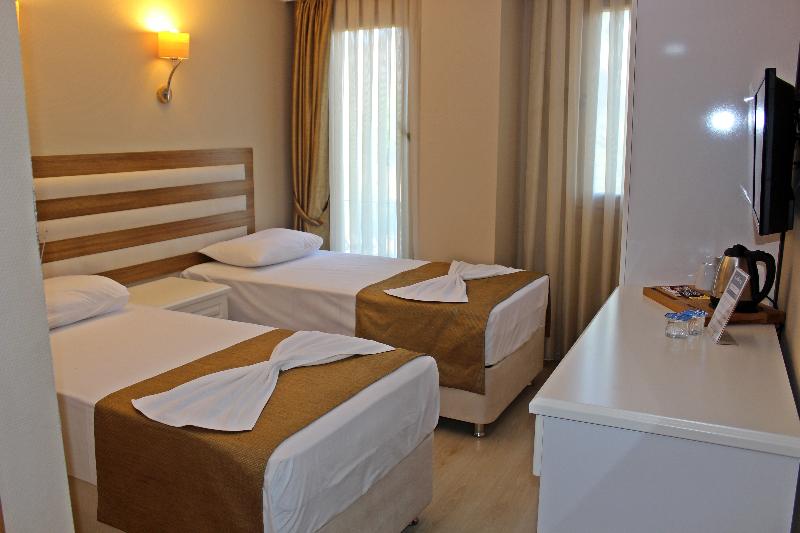Quarto standard vista mar lateral, Feza Otel