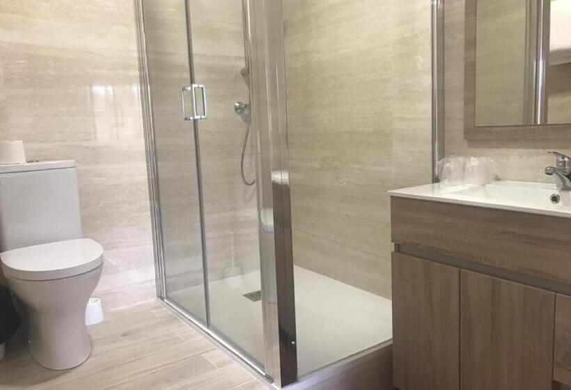 Quarto Quádruplo Deluxe, Pensión Che