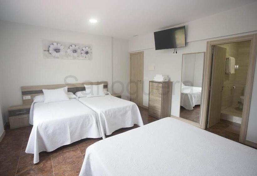 Quarto Quádruplo Deluxe, Pensión Che