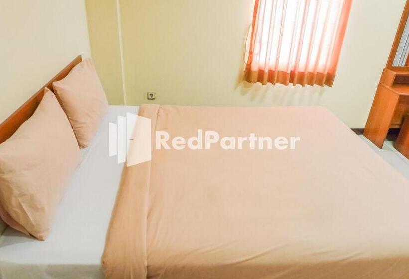 Номер Deluxe, Grand Kembar Hotel Mitra Reddoorz