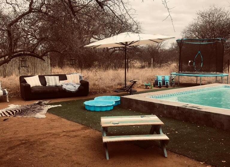 کلبه ییلاقی سوپریور یک خوابه, Simba Safaris African Pride Exotic Lodge