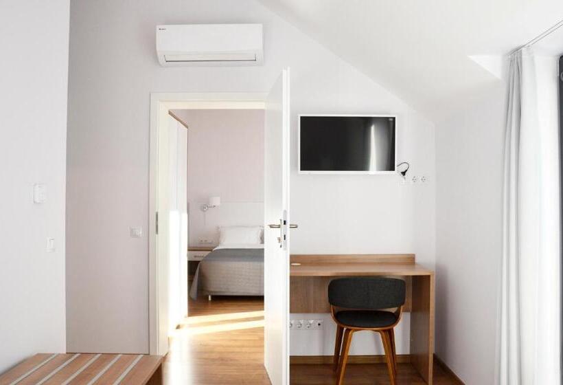 سوییت خانوادگی, Tip Tap Guest House