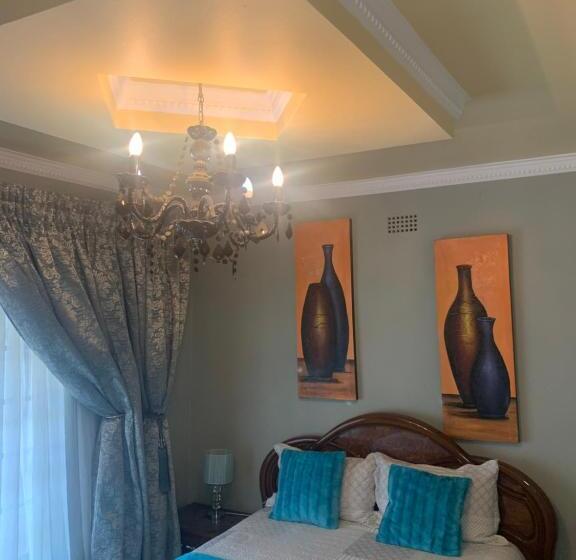 اتاق لوکس با چشم‌انداز باغ, Oleratong Guest House