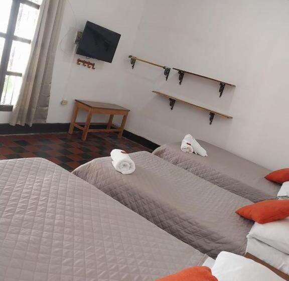 اتاق استاندارد چهارنفره با چشم‌انداز باغ, Casa Alicia Mompox