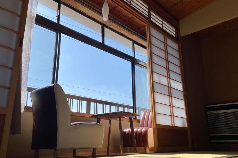 Chambre Quadruple Standard Salle de Bains Commune, ゲストハウス　華屋 (guest House Hanaya）