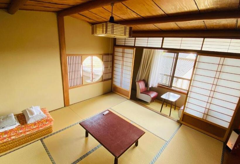 Chambre Quadruple Standard Salle de Bains Commune, ゲストハウス　華屋 (guest House Hanaya）