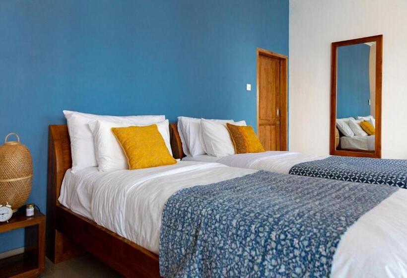 Quarto Triplo Standart Vista Mar Lateral, Pesona Beach Resort & Spa
