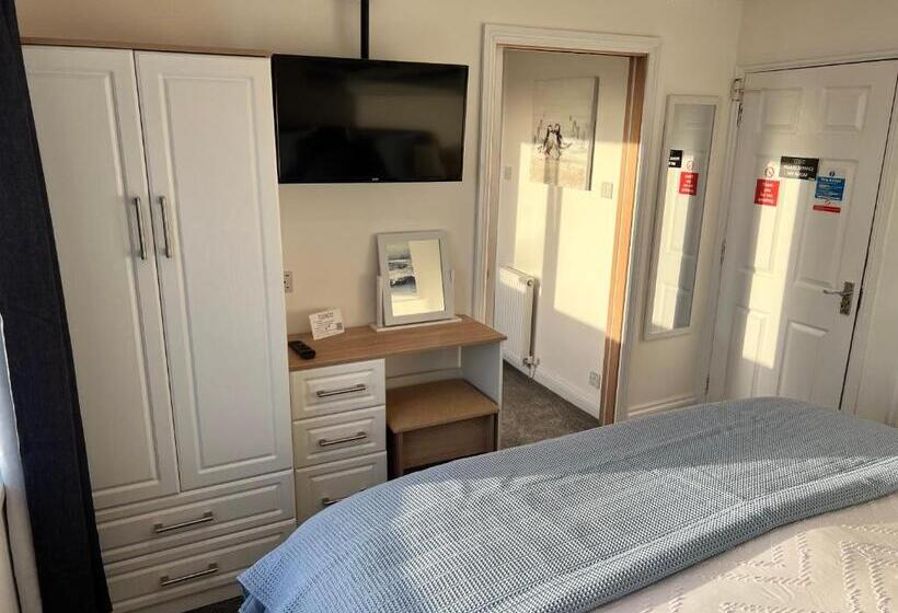 חדר דלוקס עם מיטת קינג, Coach Guest House
