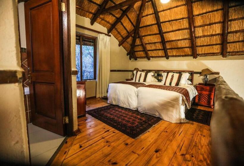 اتاق لوکس چهار تخته, Grand Kruger Lodge And Spa