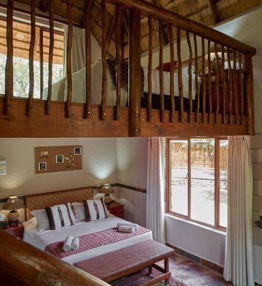 اتاق لوکس چهار تخته, Grand Kruger Lodge And Spa