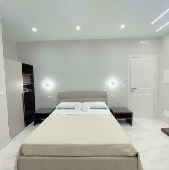 Quarto Triplo Estandar, Meligrana Central Rooms