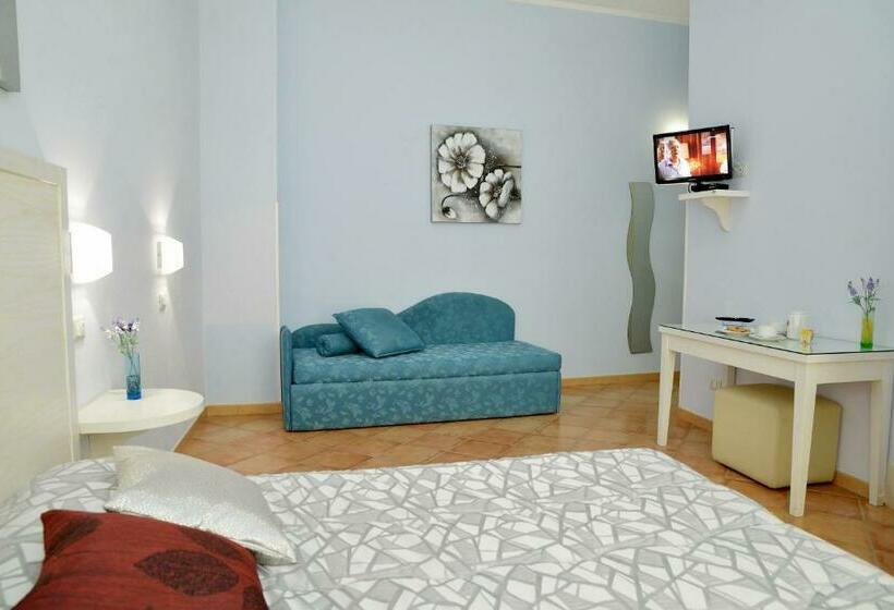 Quarto Quadruple Standart com Varanda, Badia Rooms & Breakfast