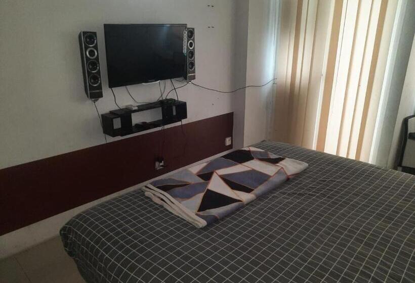 Номер Deluxe, Collection O 93386 Apartemen Grand Sentraland By Mira