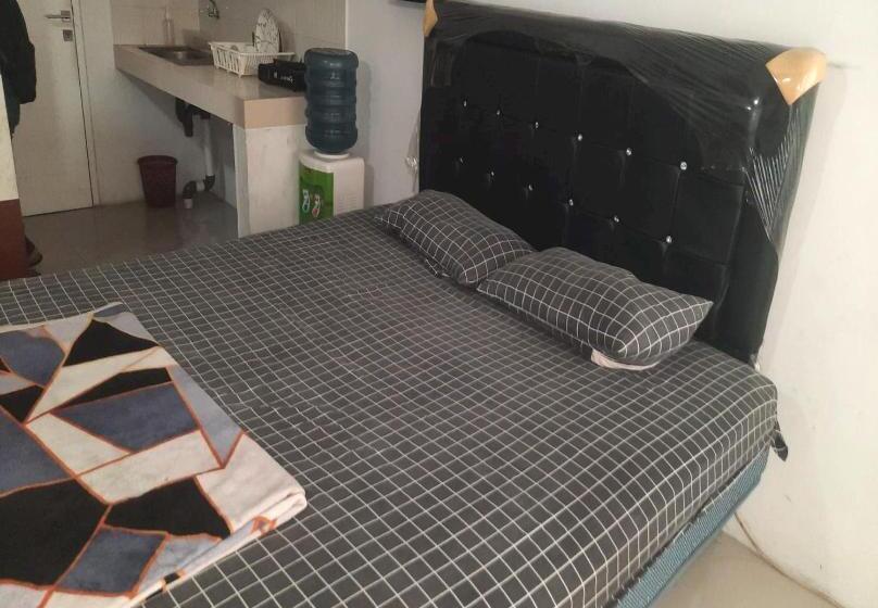 Номер Deluxe, Collection O 93386 Apartemen Grand Sentraland By Mira