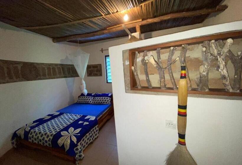 اتاق استاندارد با چشم‌انداز باغ, Lodge Au Paradis Fleuri