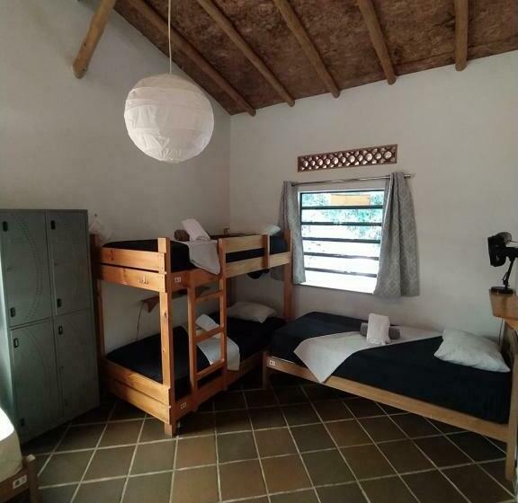 سرير فى غرفة مشتركه, Finca Hostal Bolivar   Casa Maracuya
