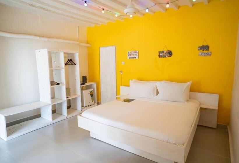 اتاق استاندارد سه تخته با چشم‌انداز باغ, Pili Pili Beach Bungalows