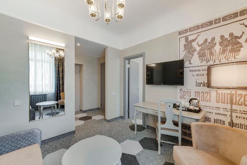 Quarto deluxe, Metropole Hotel By Semarah