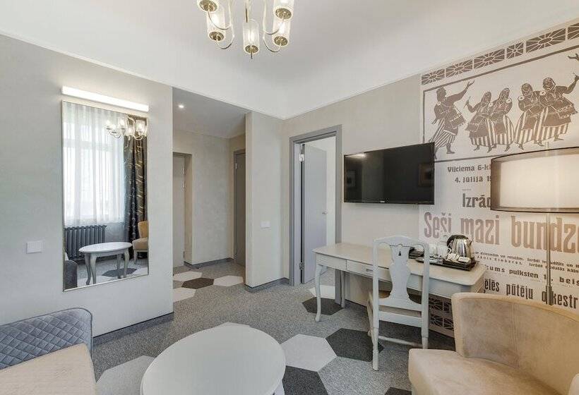 Quarto deluxe, Metropole Hotel By Semarah
