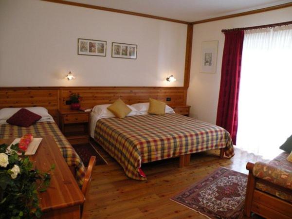 Quarto Quádruplo Estandar, Garni Civetta