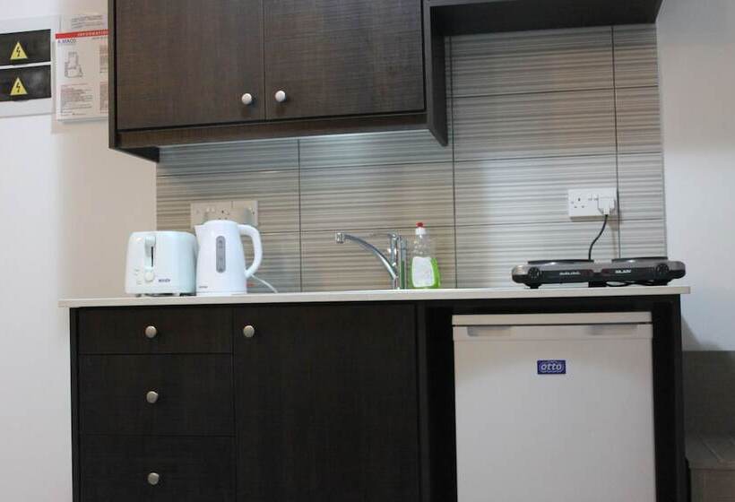 Escritório Estándar, A Maos Hotel Apartments