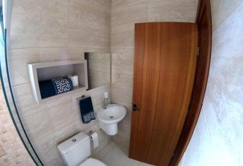 Quarto Estandar, Origin Acomodações