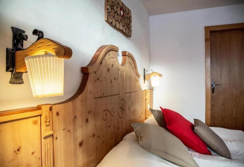 اتاق خانوادگی, Hôtel Le Relais Alpin