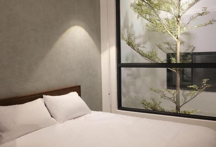 اتاق استاندارد چهار تخته, Guangfa Apartment
