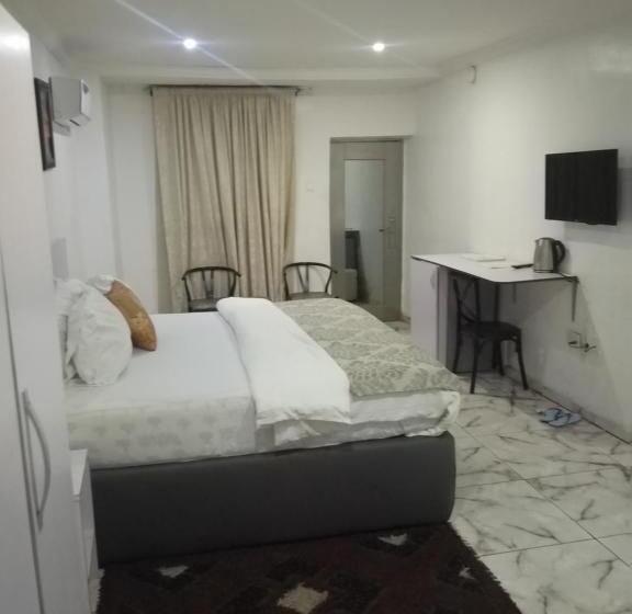 اتاق استاندارد چهار تخته, Gregory University Guest House