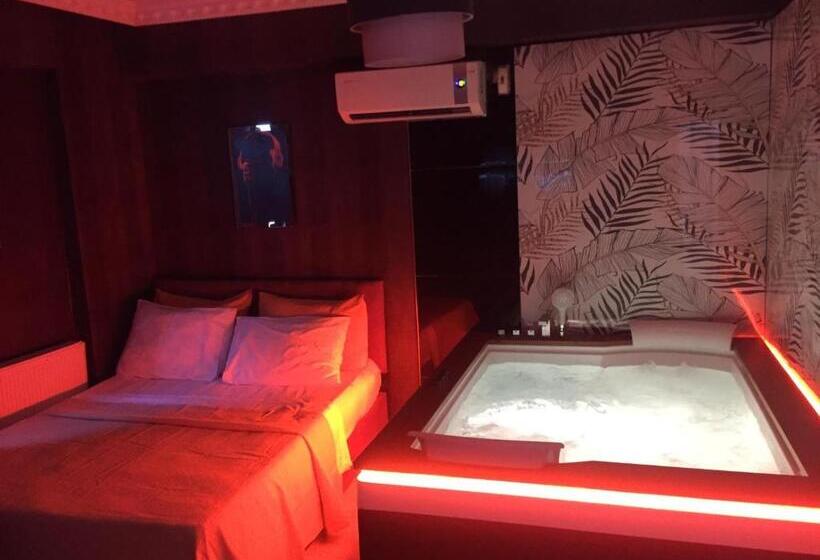 Quarto Estandar Cama King, Ottoman Suit Apartment &