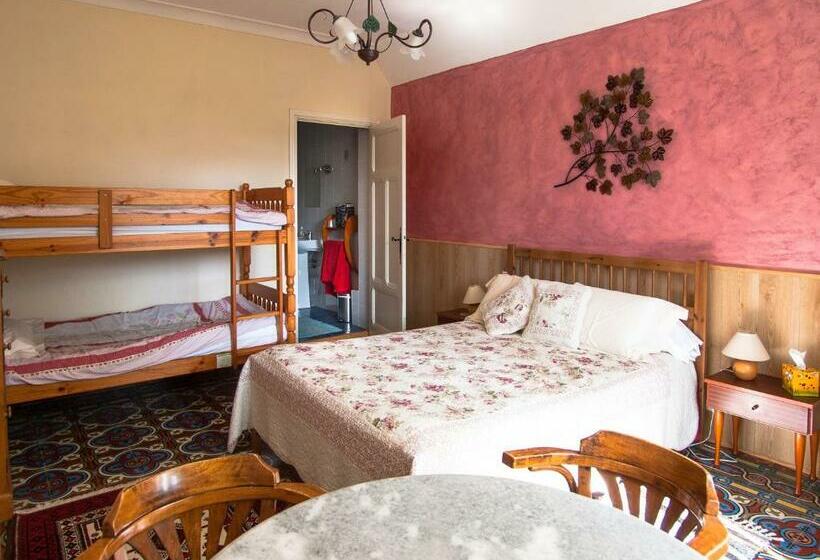 Quarto Quádruplo Estandar, Au Petit Verger