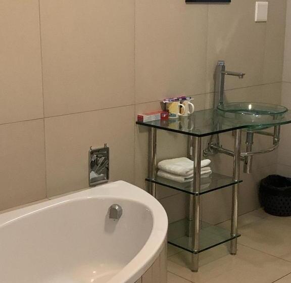 디럭스 스위트 킹 침대, Neo Horizon Guest House