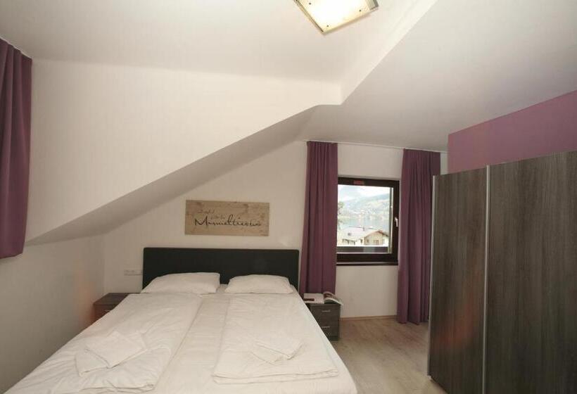 Suite with lake view, Lake And Cityhotel Edelweiss   Self Check In