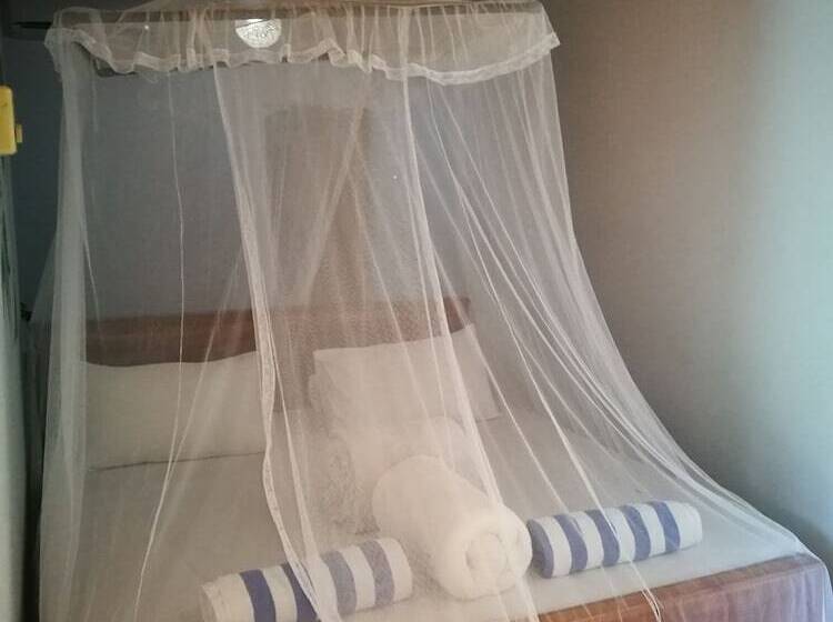 اتاق راحتی سه تخته, Frangipani Beach Villa