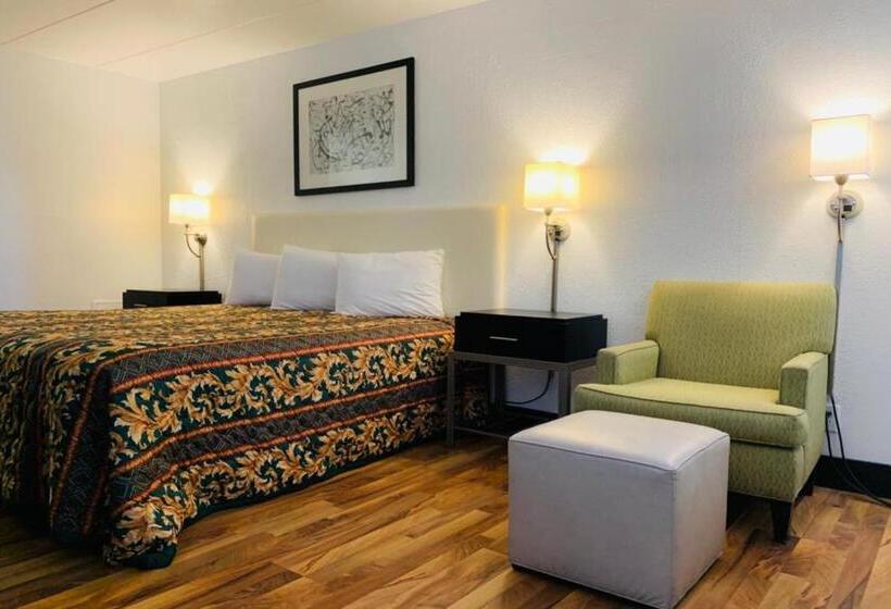 キングサイズベッドのスタンダードルーム, Economy Inn Of Holland