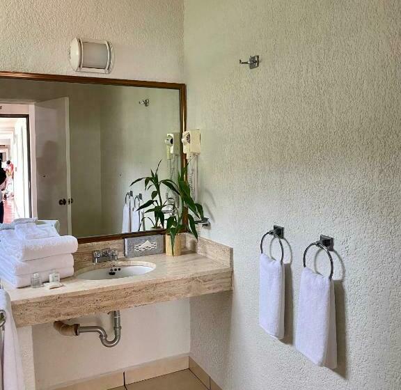 Quarto Deluxe Vista Mar, Costa Sur Resort & Spa