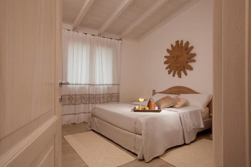 Апартаменты Deluxe 1 Спальня, Punta Falcone Resort
