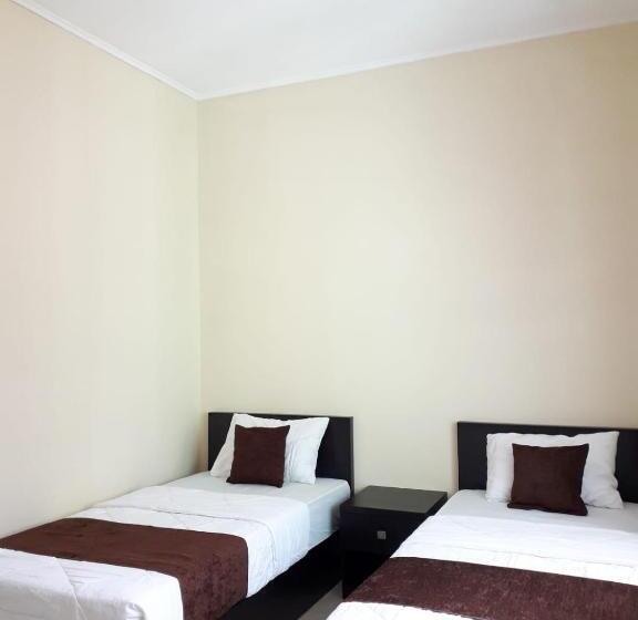 Quarto Estandar com Terraço, Unram Guest House