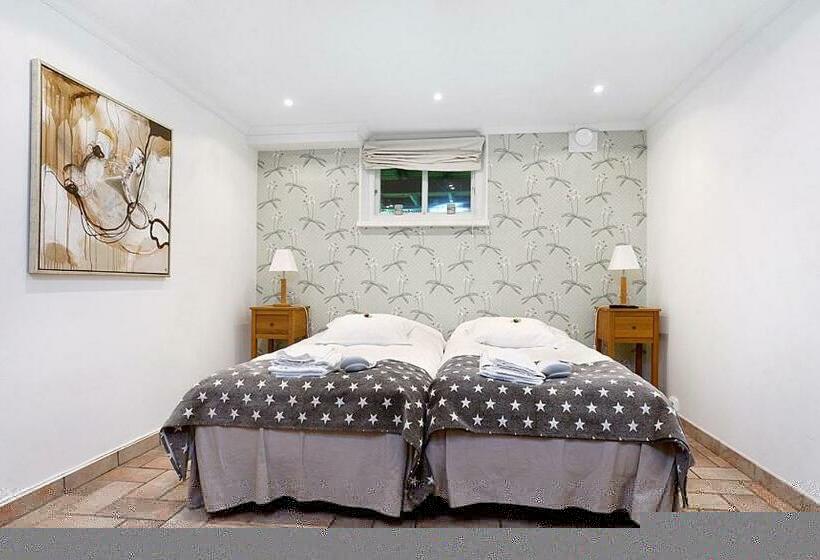 اتاق خانوادگی, 5:ans Bed & Breakfast