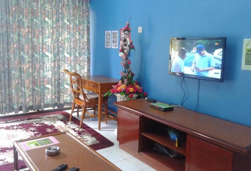 اتاق خانوادگی با چشم‌انداز باغ, Seri Lagenda Apartment