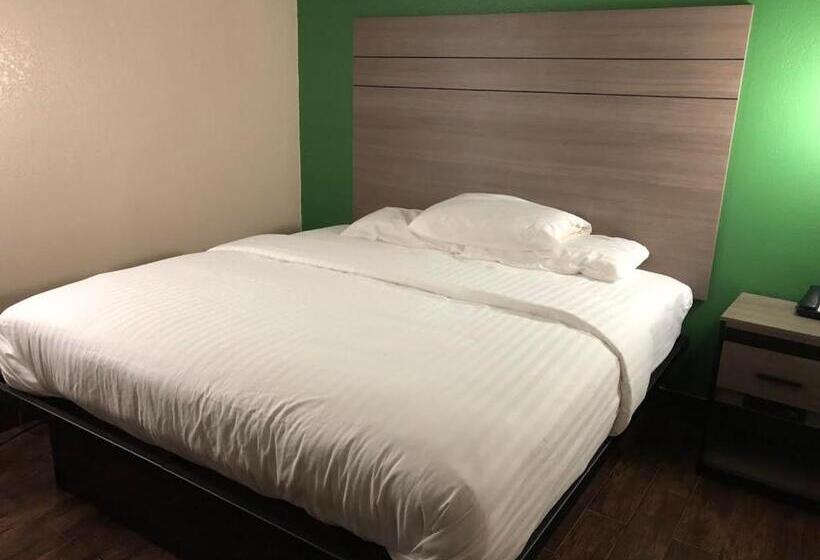 디럭스 스위트 킹 침대, Travelers Inn & Suites