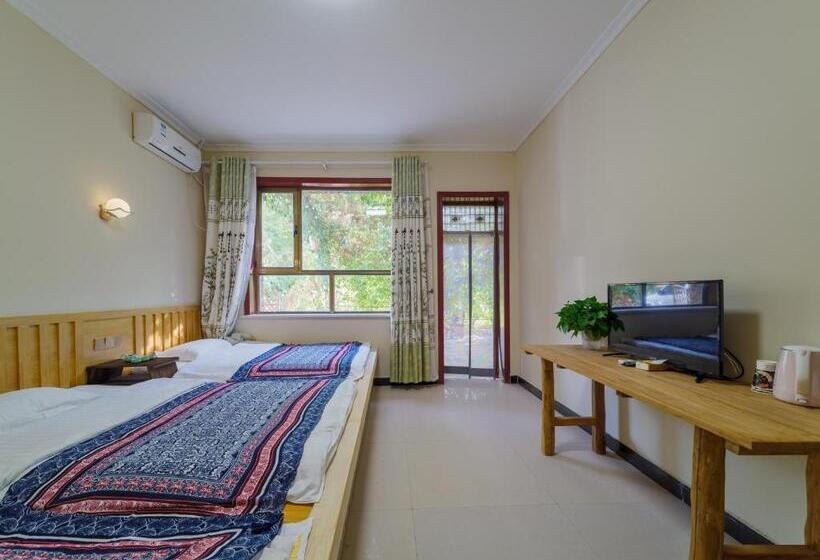 غرفة قياسية ثلاثية مطلة علي الحديقة, Dunhuang Hu Yang Inn