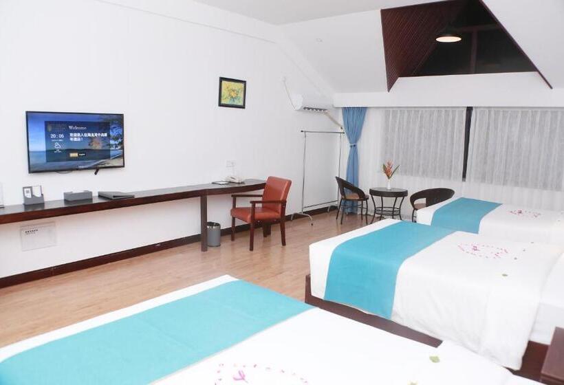 اتاق سه نفره دلوکس با چشم‌انداز دریا, Sealong Bay Zhongqi Conifer Hotel 海龙湾中启康年酒店