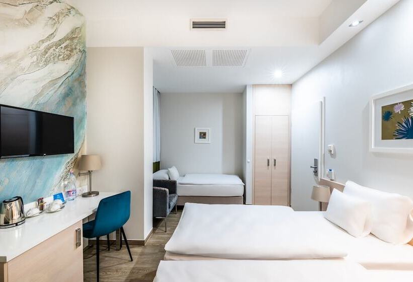 Quarto Estandar, Atrium Fashion