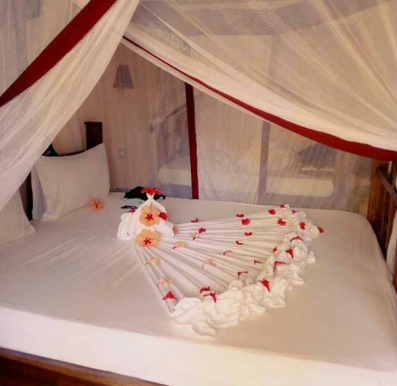 اتاق استاندارد سه تخته با چشم‌انداز باغ, Uroa Bay Beach Resort