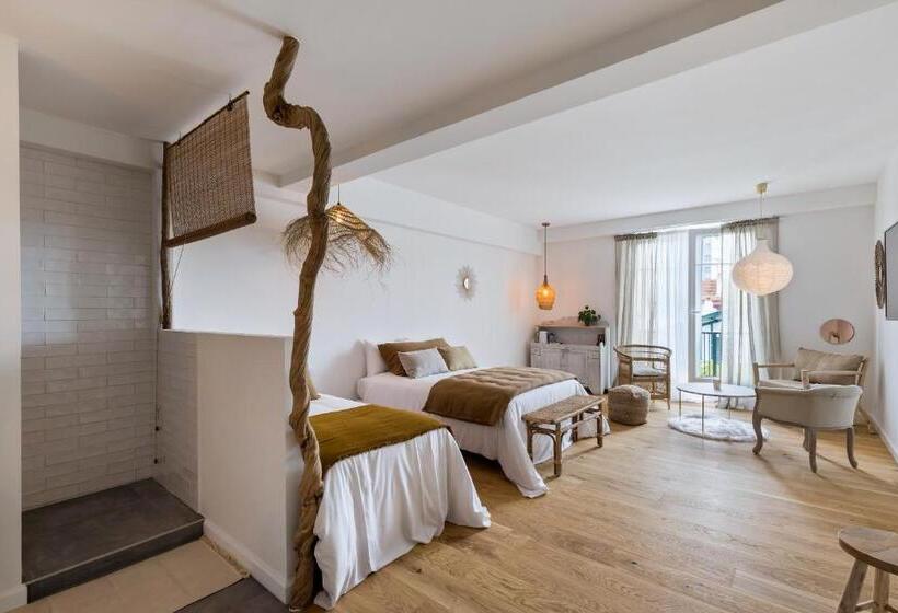 Quarto Triplo Comfort, Libertitu