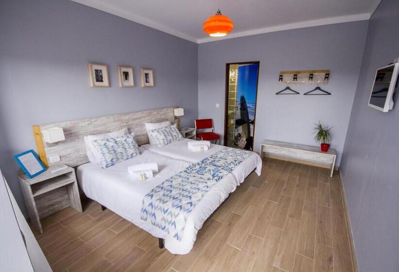 Quarto Estandar, O Tourinho