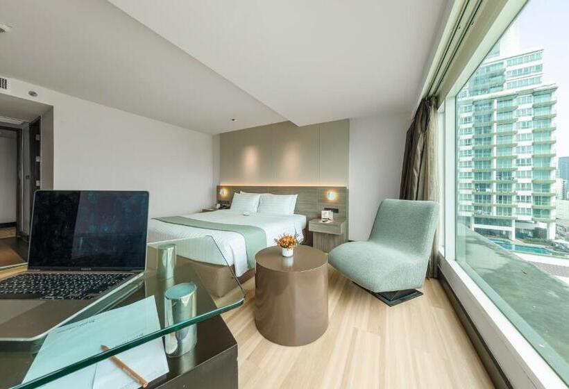 Quarto Deluxe, Golden Tulip Mandison Suites