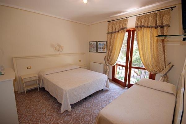 اتاق استاندارد چهار تخته, Villa Capitorsola